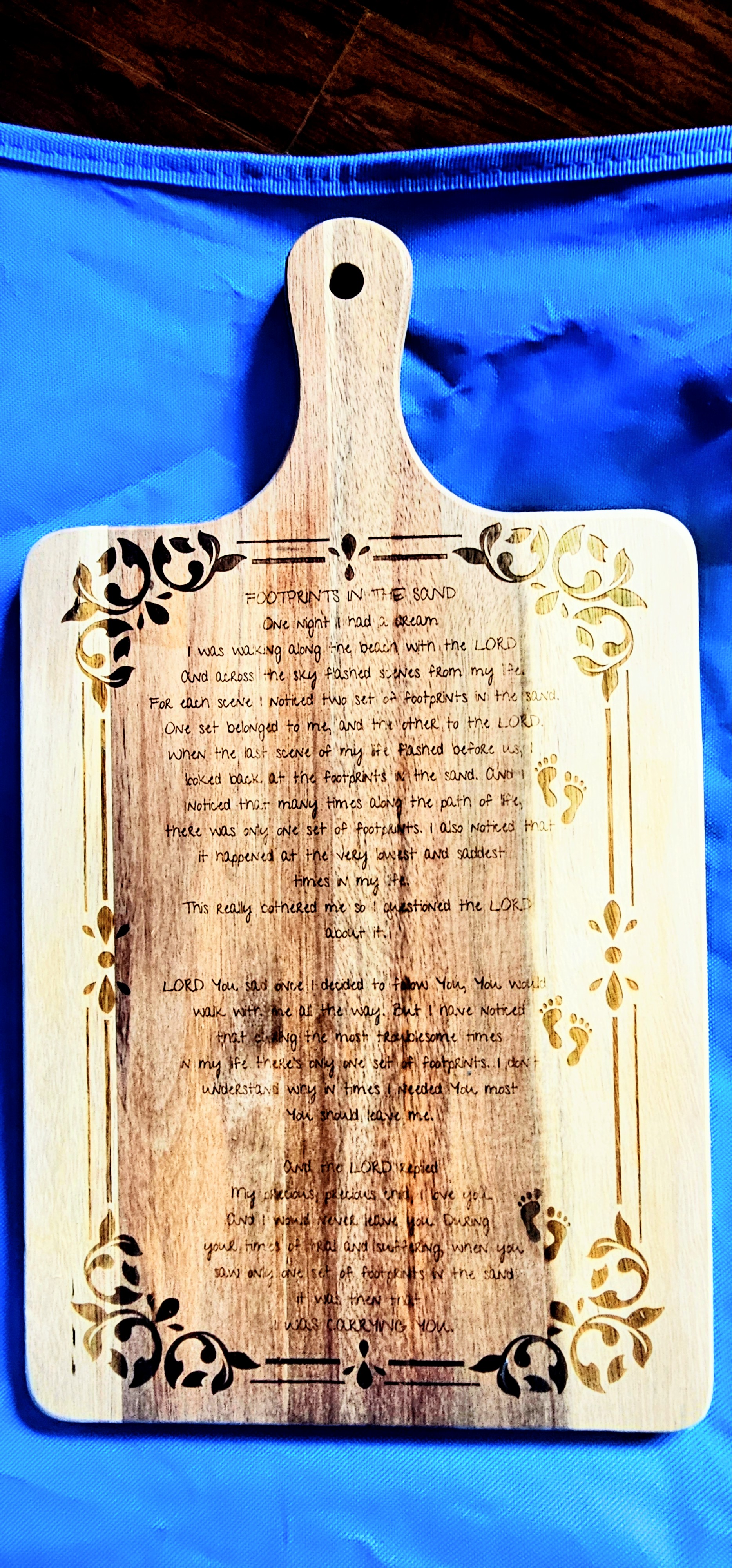 footprints in the sand cutting board.jpg